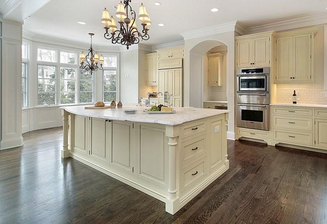 modern kitchen with laminate flooring in Walford, IA